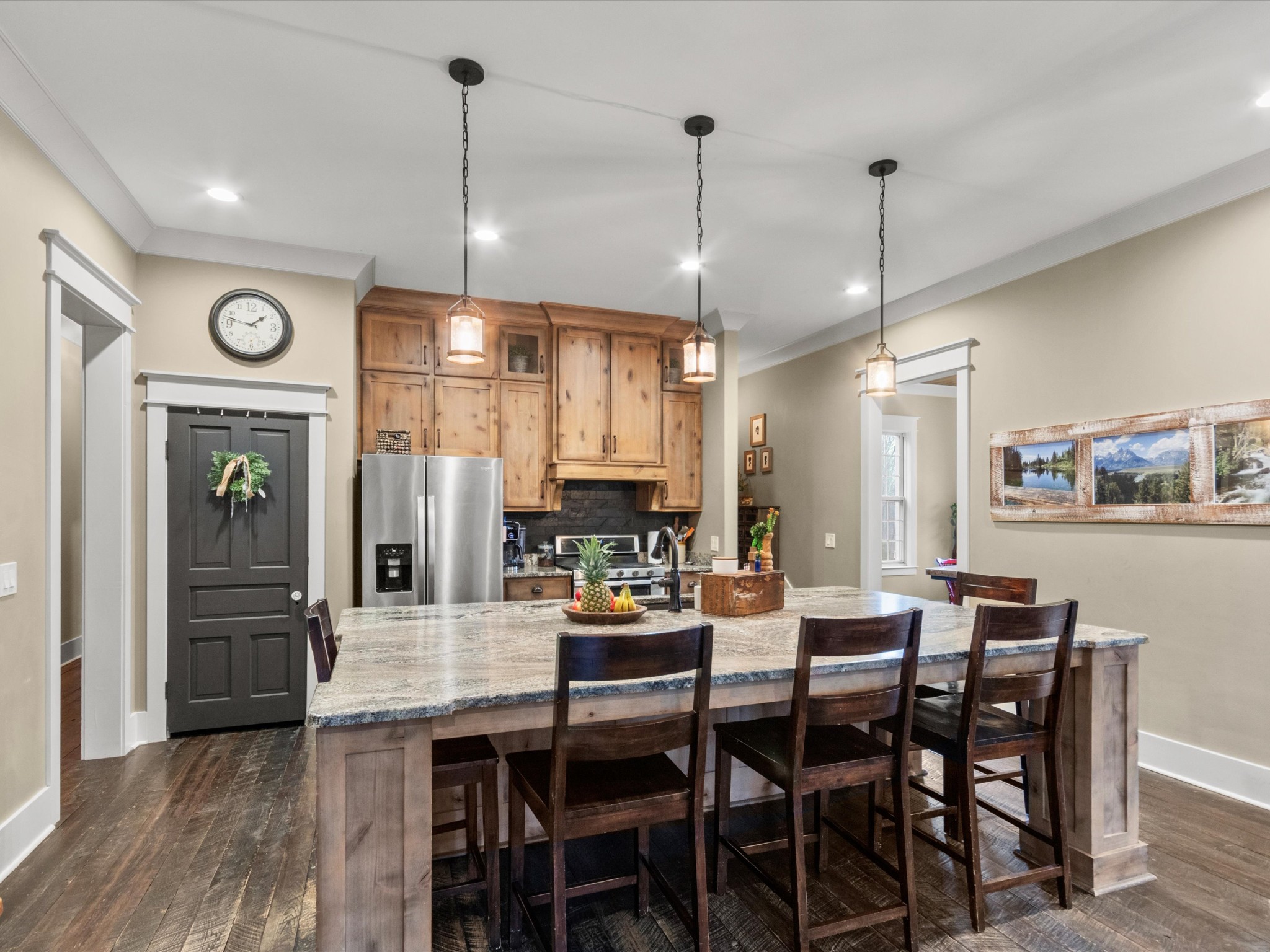 950 Puncheon Branch Road Minor Hill, TN 38473 - Photo 12 of 51 a dining area with a table chairs and a kitchen view