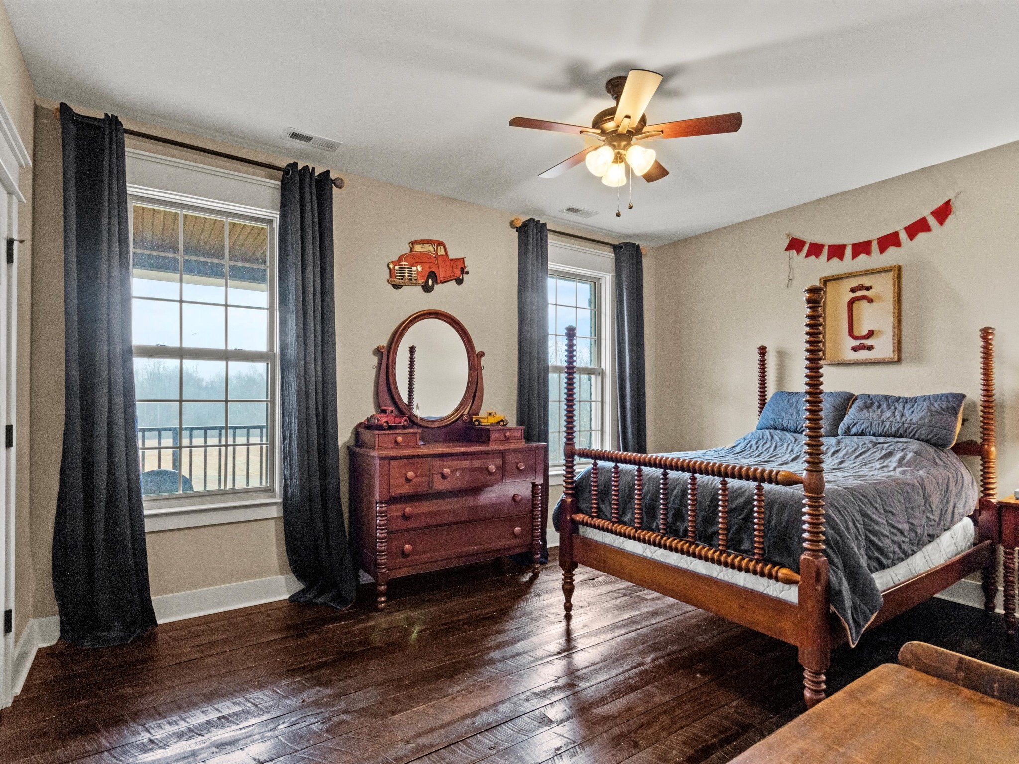 950 Puncheon Branch Road Minor Hill, TN 38473 - Photo 22 of 51 a bedroom with furniture and a window