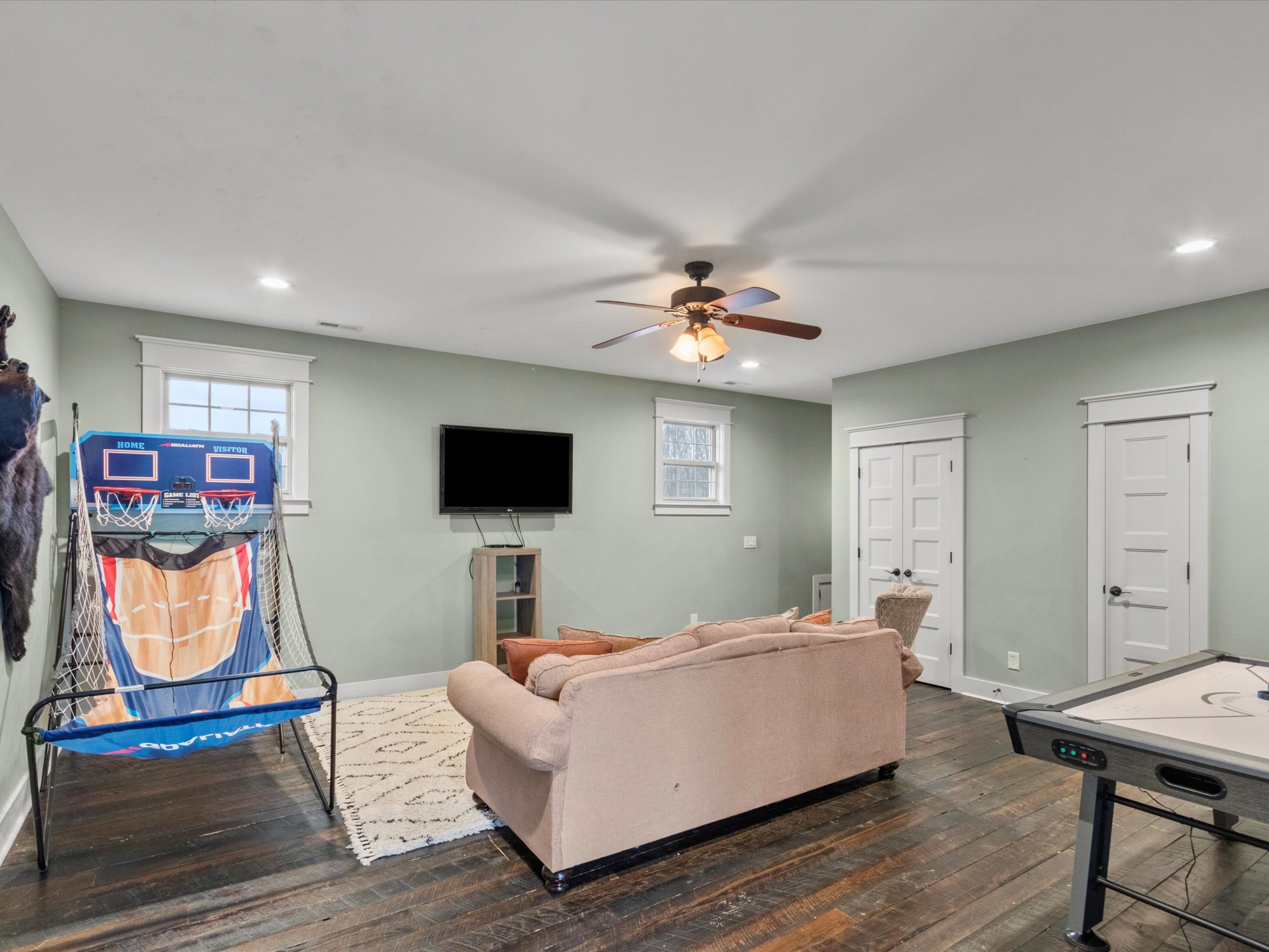 950 Puncheon Branch Road Minor Hill, TN 38473 - Photo 36 of 51 a living room with furniture and a flat screen tv