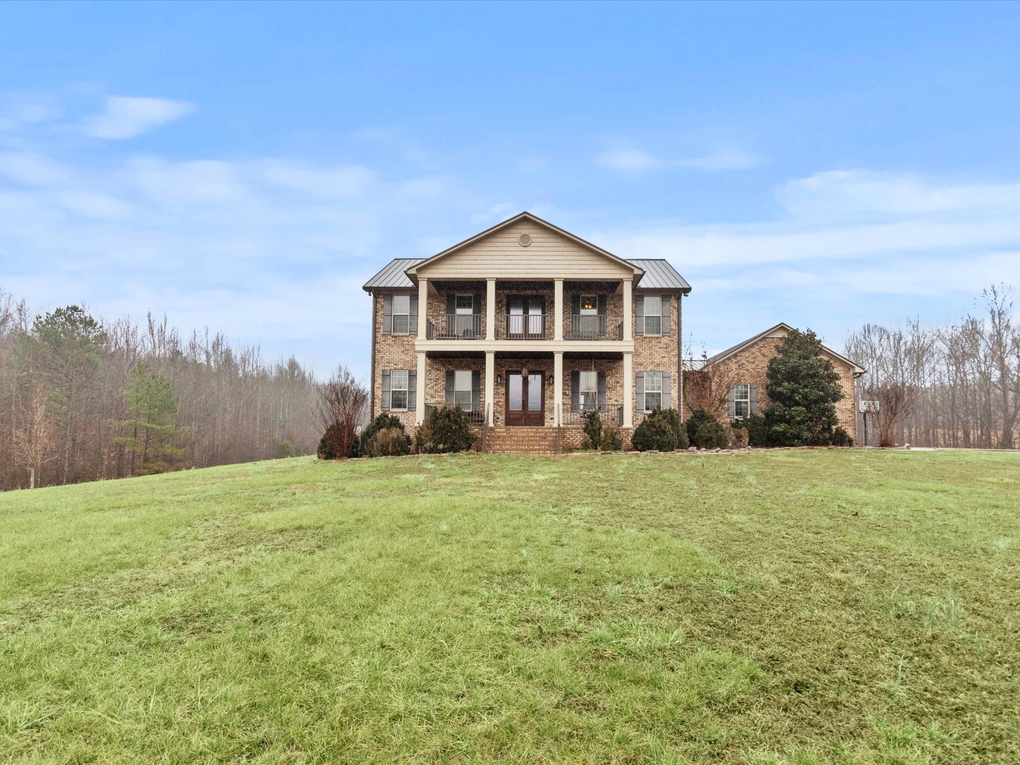 950 Puncheon Branch Road Minor Hill, TN 38473 - Photo 40 of 51 a front view of a house with a yard