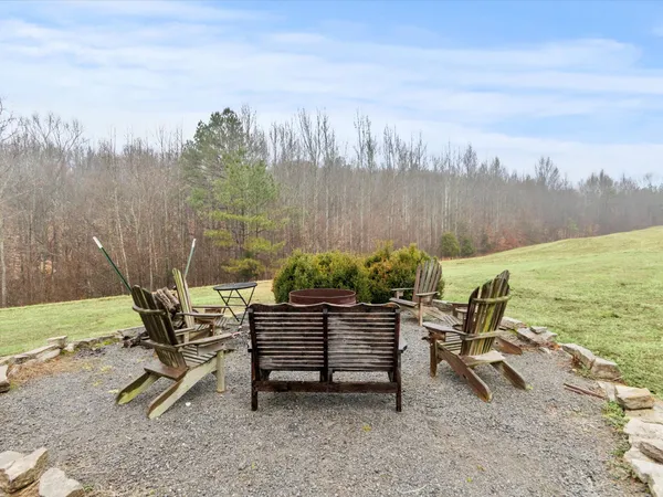 a view of a chairs and table on the terrace