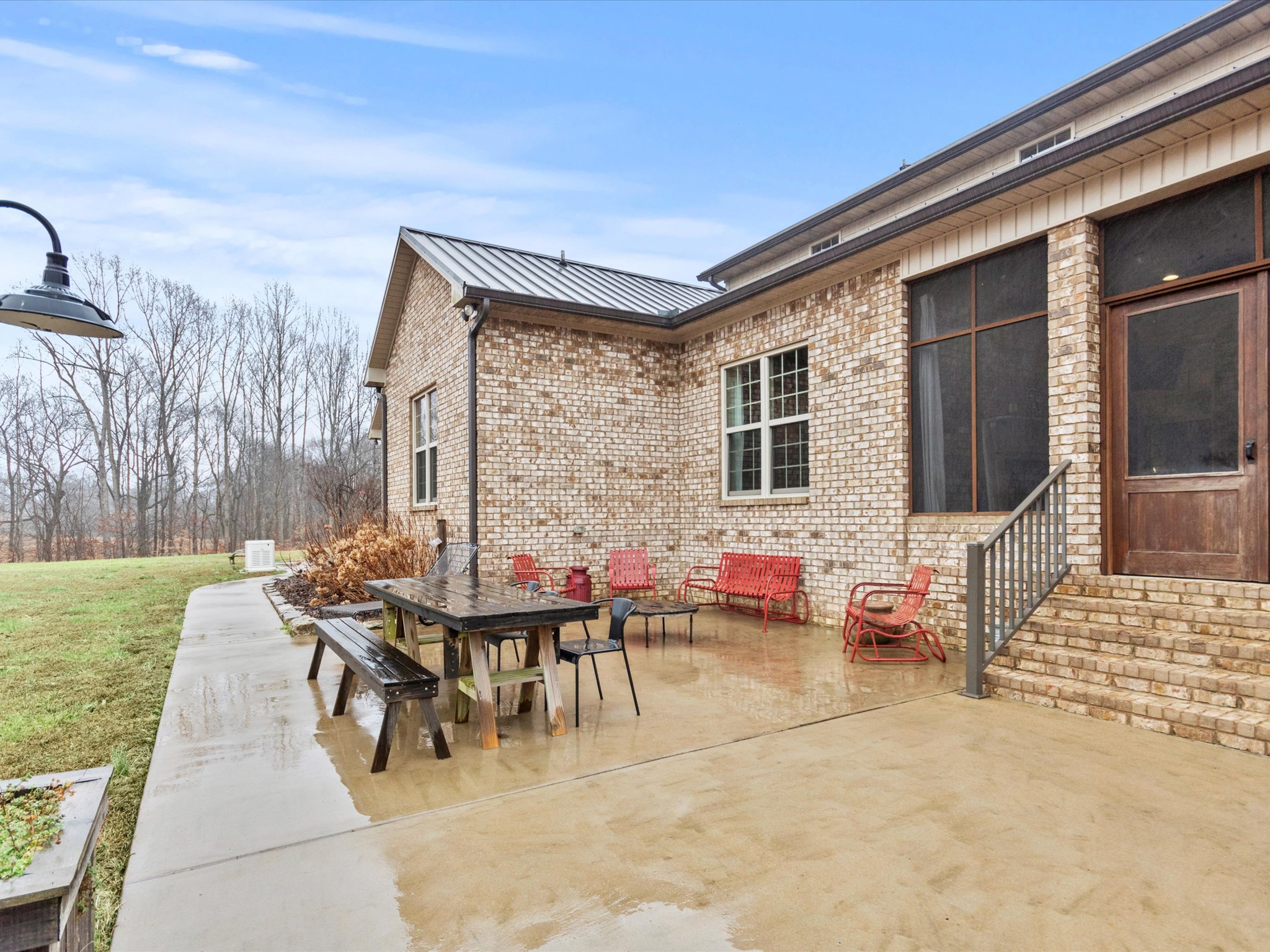 950 Puncheon Branch Road Minor Hill, TN 38473 - Photo 43 of 51 a view of a patio with table and chairs and potted plants