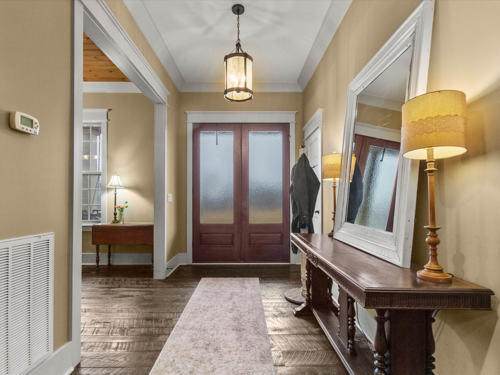 950 Puncheon Branch Road Minor Hill, TN 38473 - Photo 6 of 51 a view of hallway with furniture and a chandelier