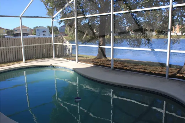 a room with water heater and wooden floor