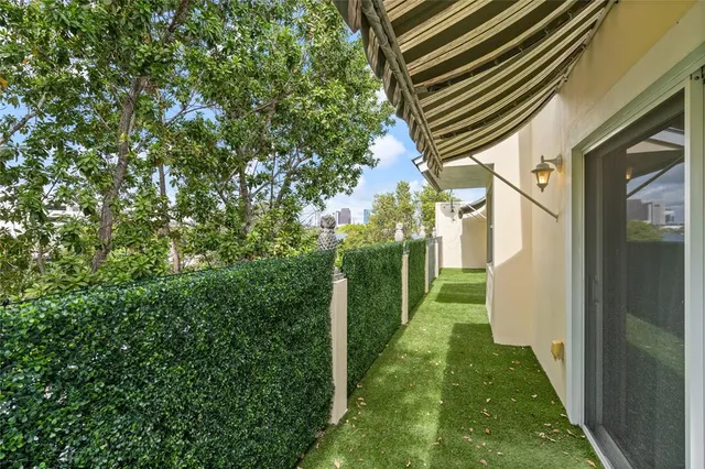 a backyard of a house with lots of green space