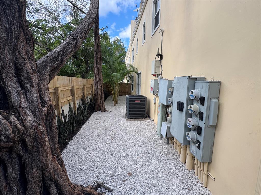 630 Southeast 15th Street, Unit 7 Fort Lauderdale, FL 33316 - Photo 17 of 21 front view of a house with a yard
