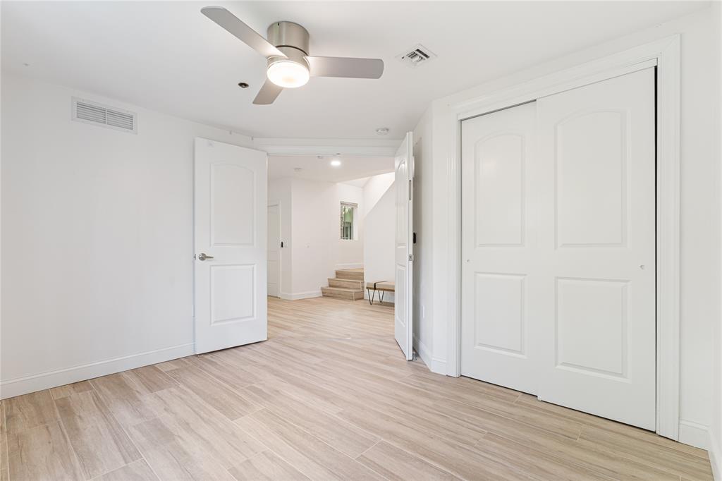 630 Southeast 15th Street, Unit 7 Fort Lauderdale, FL 33316 - Photo 10 of 21 wooden floor in an empty room with a window