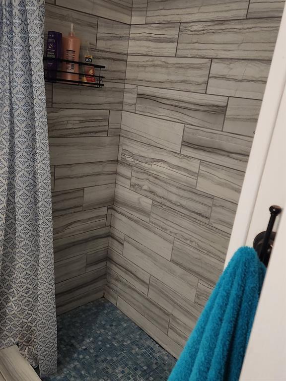 541 Bakers Branch Road Waxahachie, TX 75167 - Photo 12 of 13 a bathroom with a shower