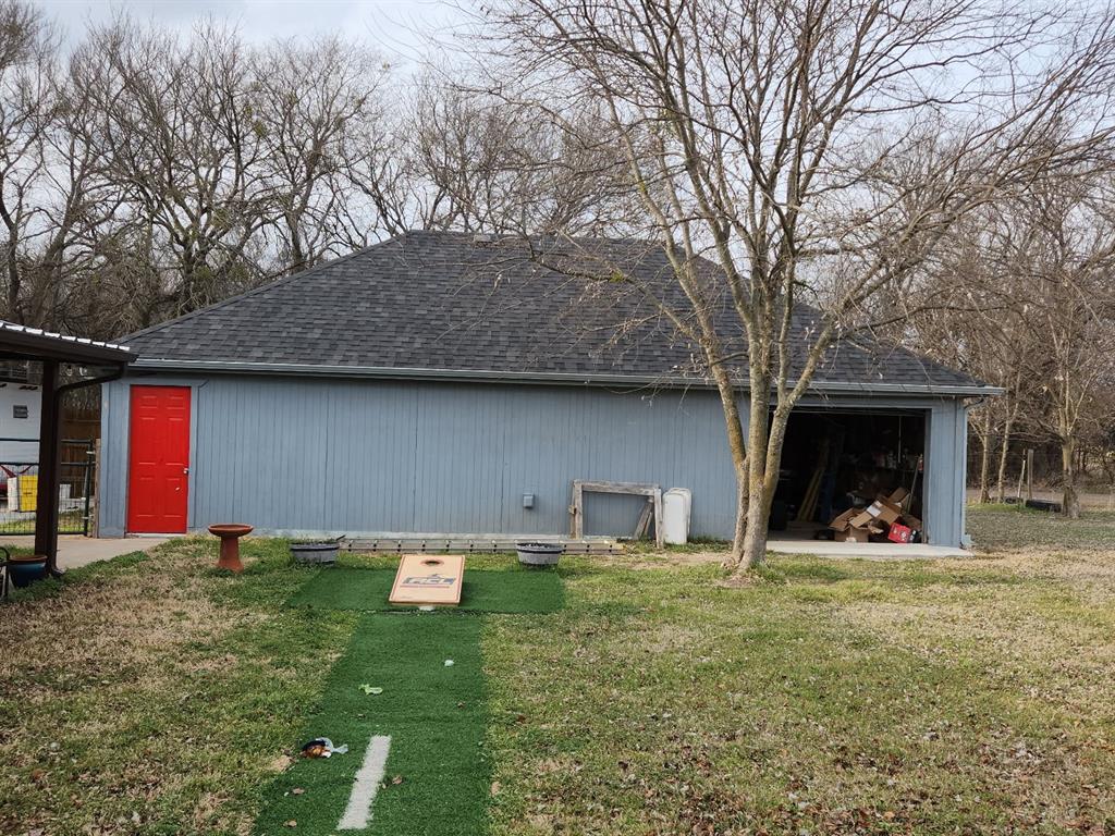541 Bakers Branch Road Waxahachie, TX 75167 - Photo 13 of 13 a backyard of a house with lots of green space