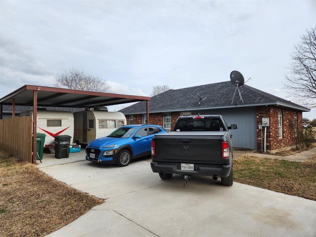 541 Bakers Branch Road Waxahachie, TX 75167 - Photo 2 of 13 a car parked in front of a house