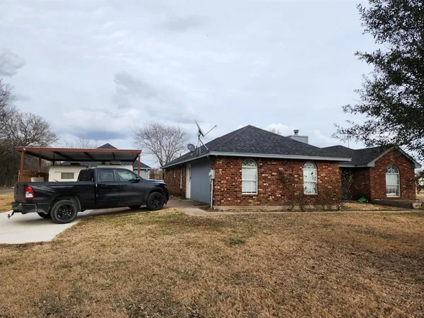 a car parked in front of a house