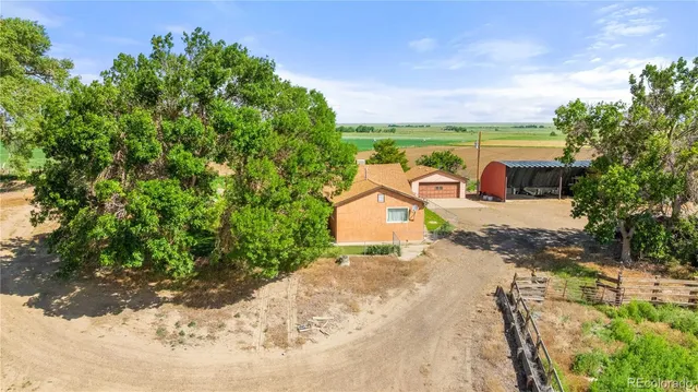 a view of a road with a yard