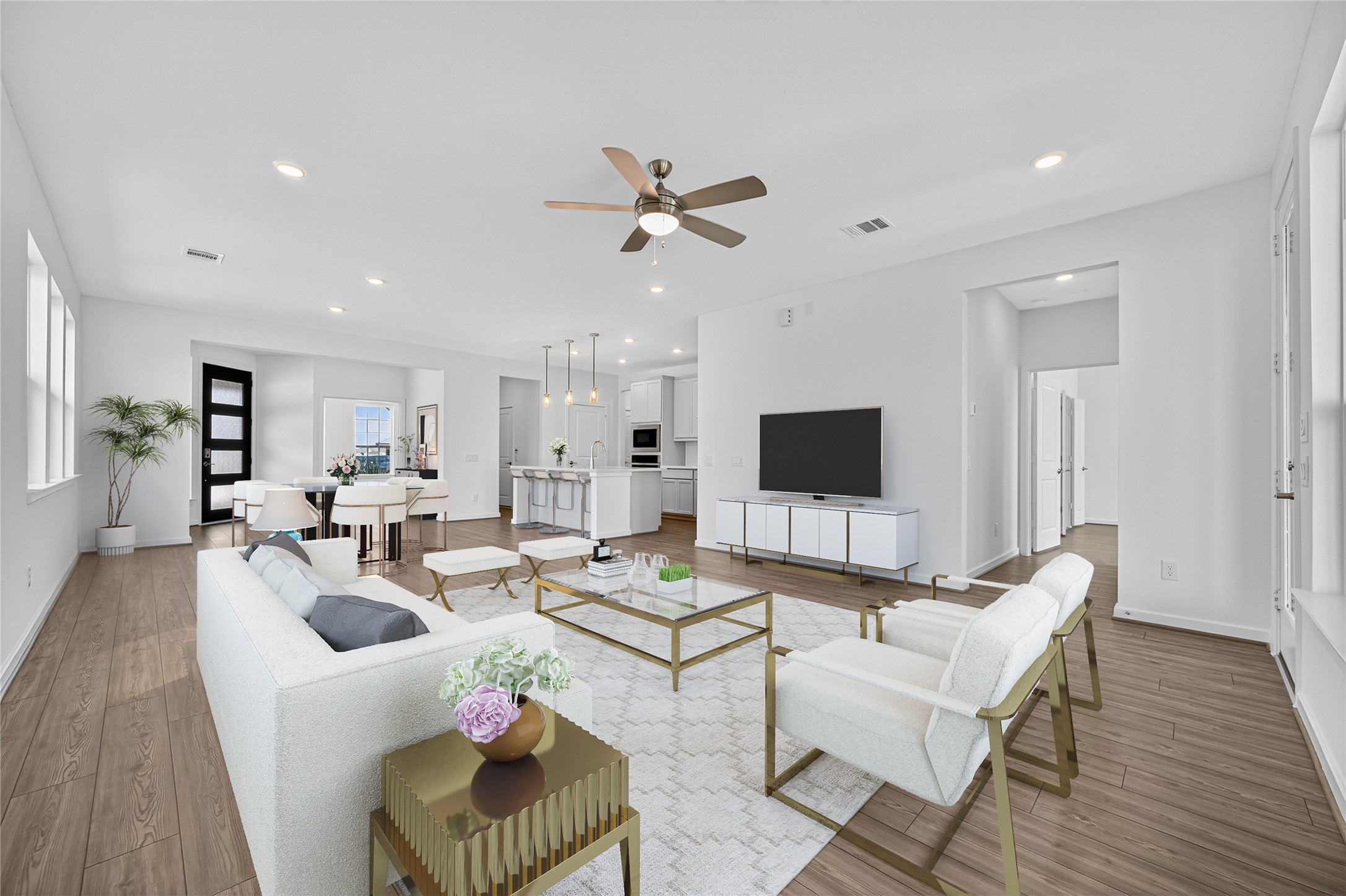 4702 Rustic Grv Lane Fulshear, TX 77441 - Photo 14 of 37 a living room with furniture and a flat screen tv