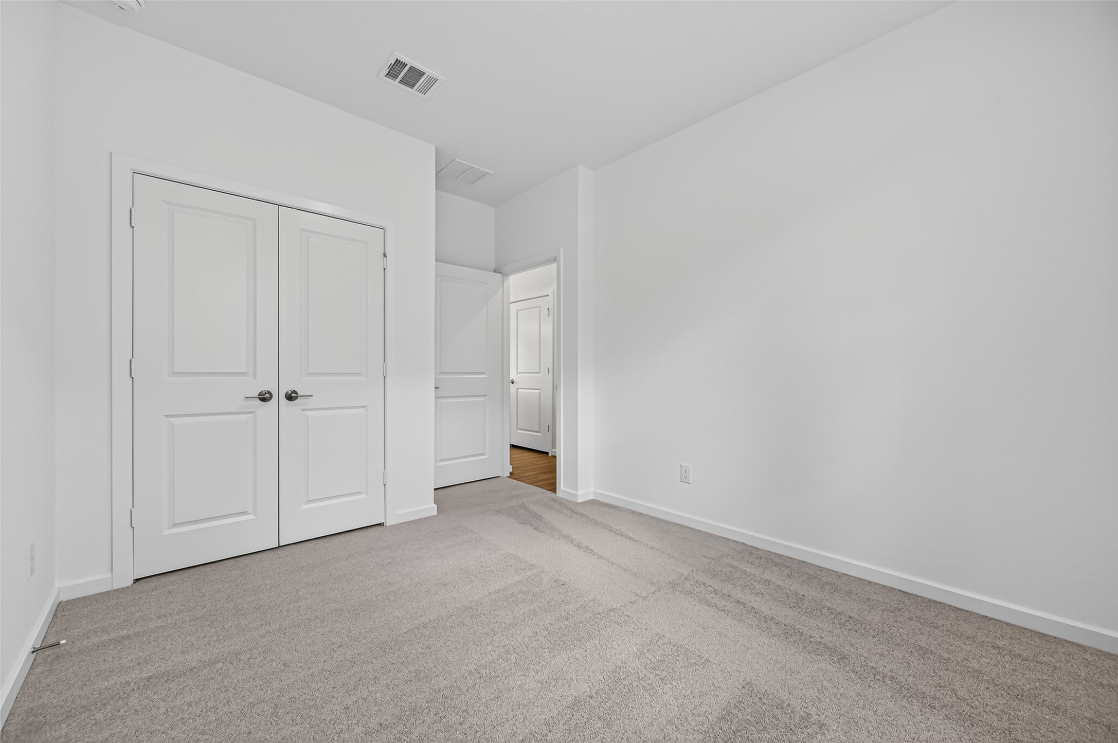 4702 Rustic Grv Lane Fulshear, TX 77441 - Photo 21 of 37 a view of an empty room and closet area