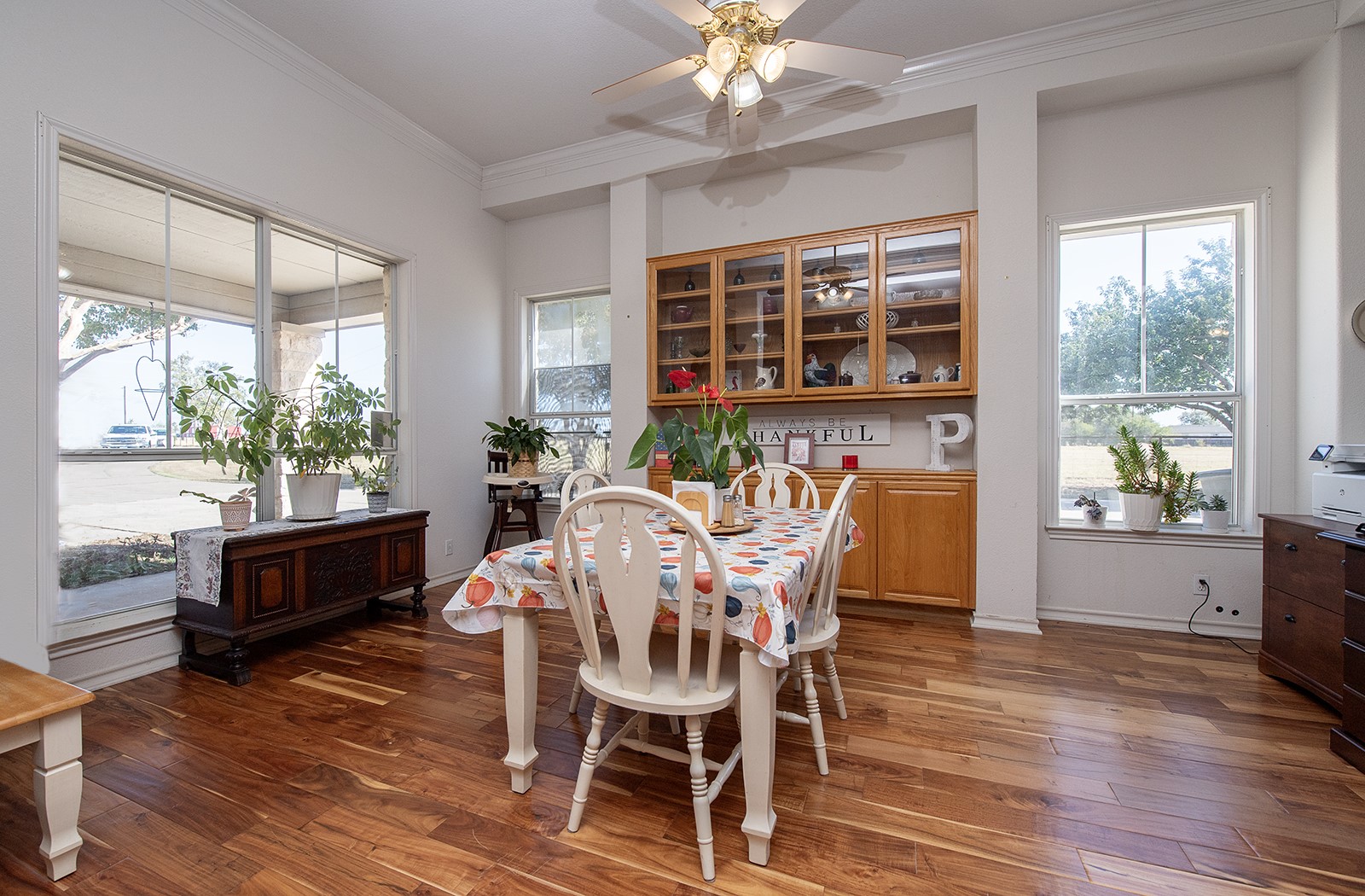 1833 County Road 305 Jarrell, TX 76537 - Photo 35 of 40 Dining area with built in oak cabinets and many large windows.