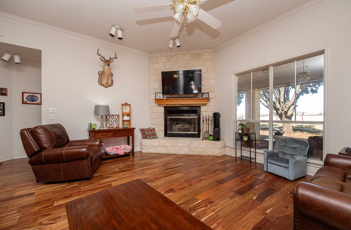 1833 County Road 305 Jarrell, TX 76537 - Photo 39 of 40 a living room with furniture fireplace and flat screen tv