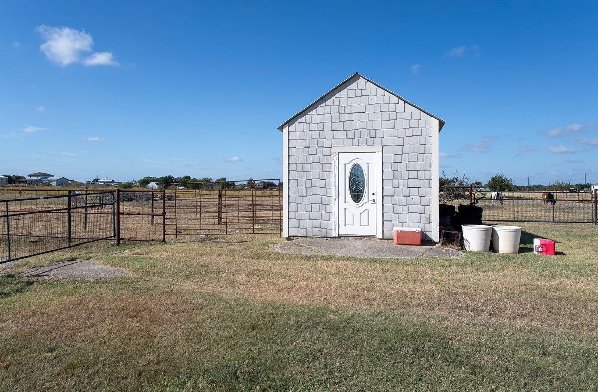 1833 County Road 305 Jarrell, TX 76537 - Photo 4 of 40 a view of a house with floor to ceiling window and city view