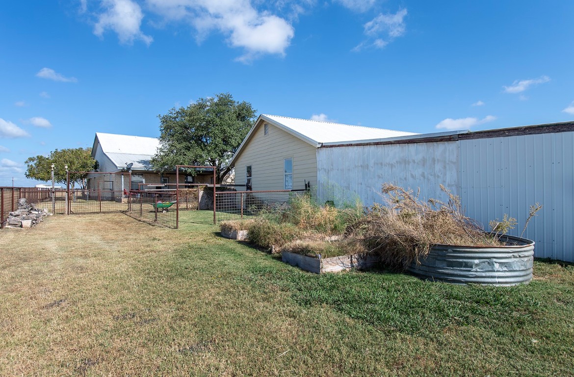 1833 County Road 305 Jarrell, TX 76537 - Photo 6 of 40 a front view of a house with a yard