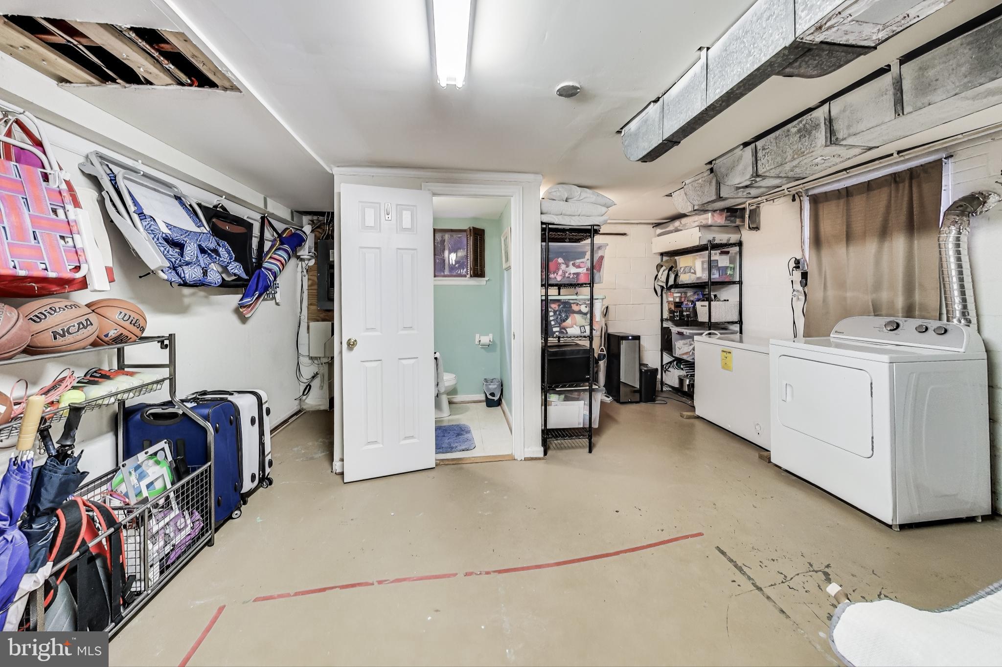 9512 Flower Avenue Silver Spring, MD 20901 - Photo 31 of 41 a view of storage and utility room