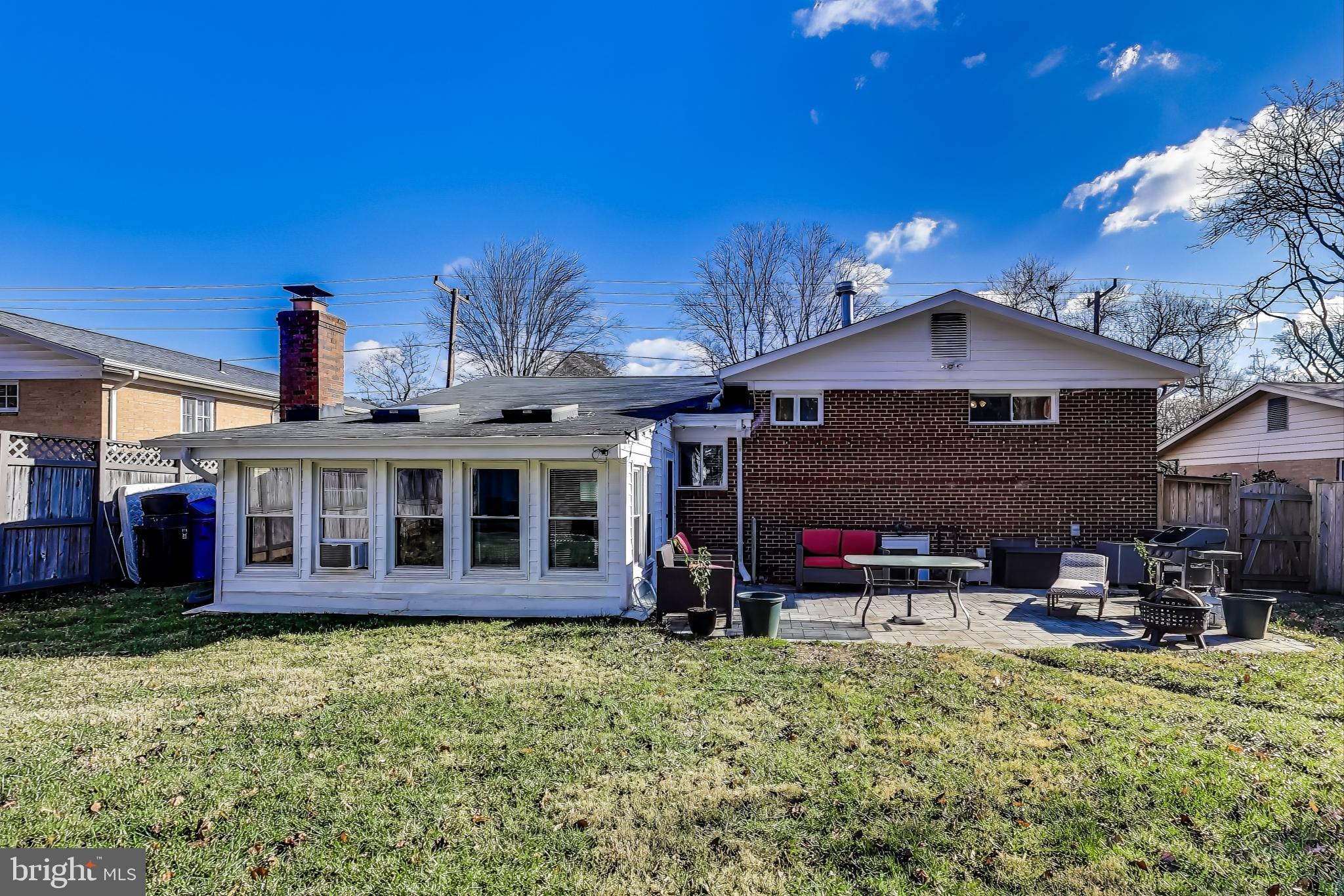 9512 Flower Avenue Silver Spring, MD 20901 - Photo 34 of 41 a front view of a house with a yard balcony