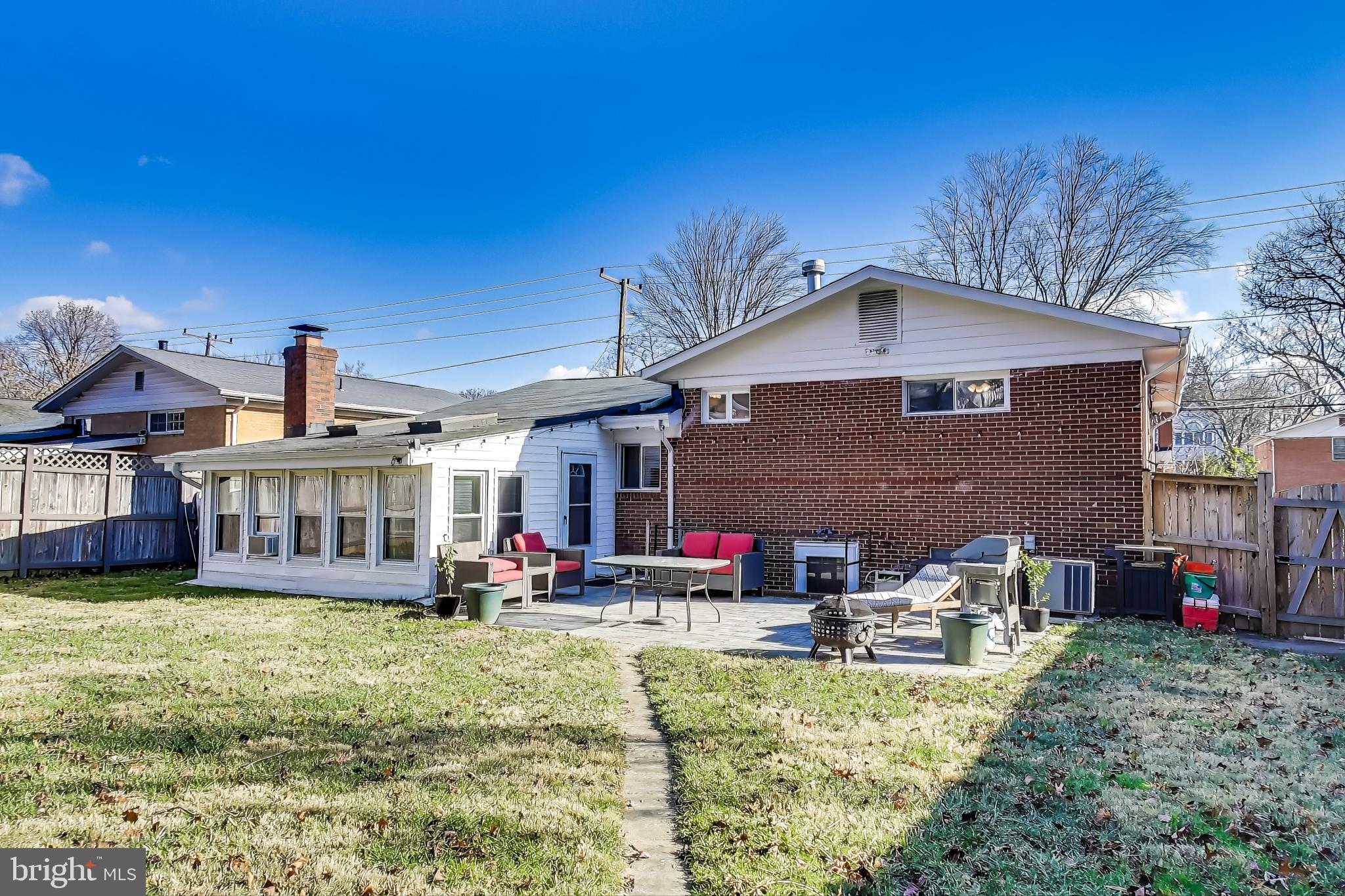 9512 Flower Avenue Silver Spring, MD 20901 - Photo 35 of 41 a view of a house with swimming pool and sitting area