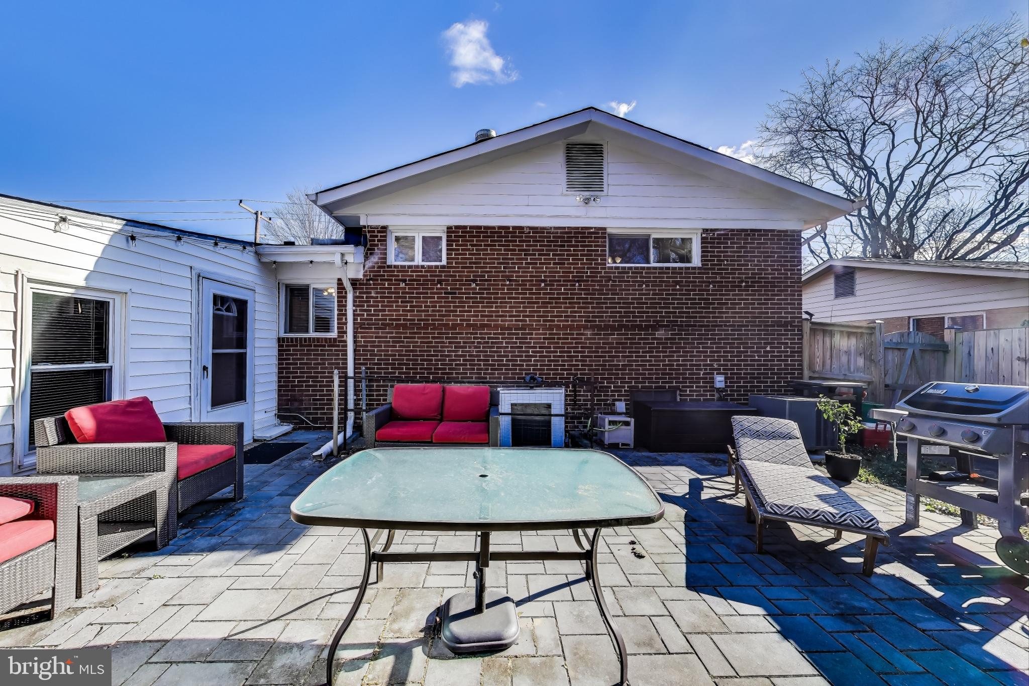 9512 Flower Avenue Silver Spring, MD 20901 - Photo 36 of 41 a backyard of a house with seating space