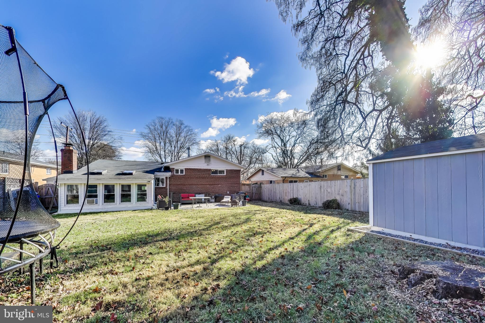 9512 Flower Avenue Silver Spring, MD 20901 - Photo 40 of 41 a view of a house with a yard