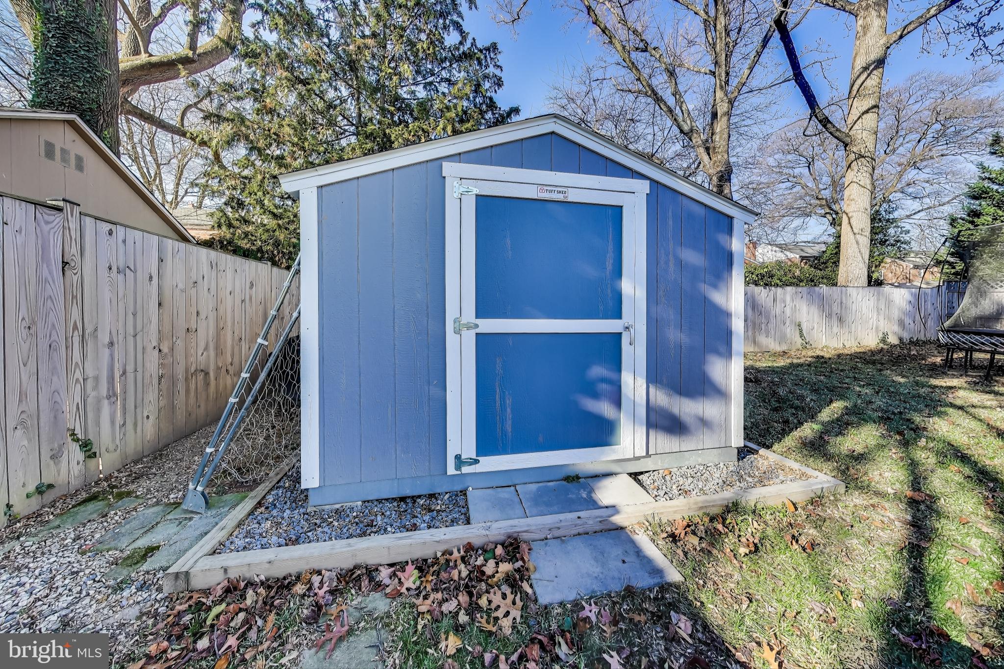 9512 Flower Avenue Silver Spring, MD 20901 - Photo 41 of 41 a front view of a house with a yard