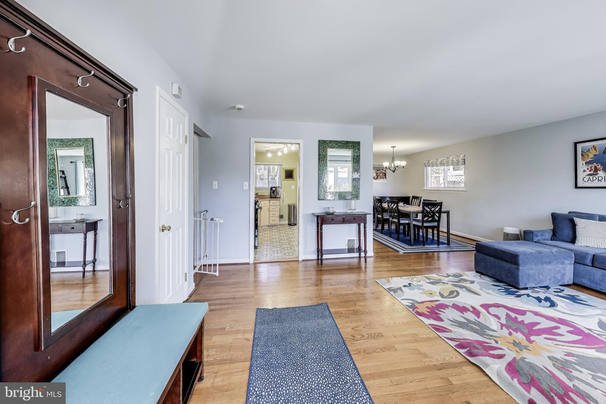 9512 Flower Avenue Silver Spring, MD 20901 - Photo 5 of 41 a living room with furniture and a table