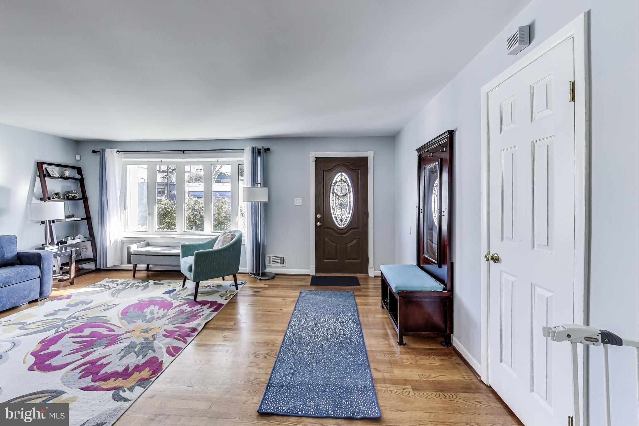9512 Flower Avenue Silver Spring, MD 20901 - Photo 6 of 41 a living room with furniture and a window