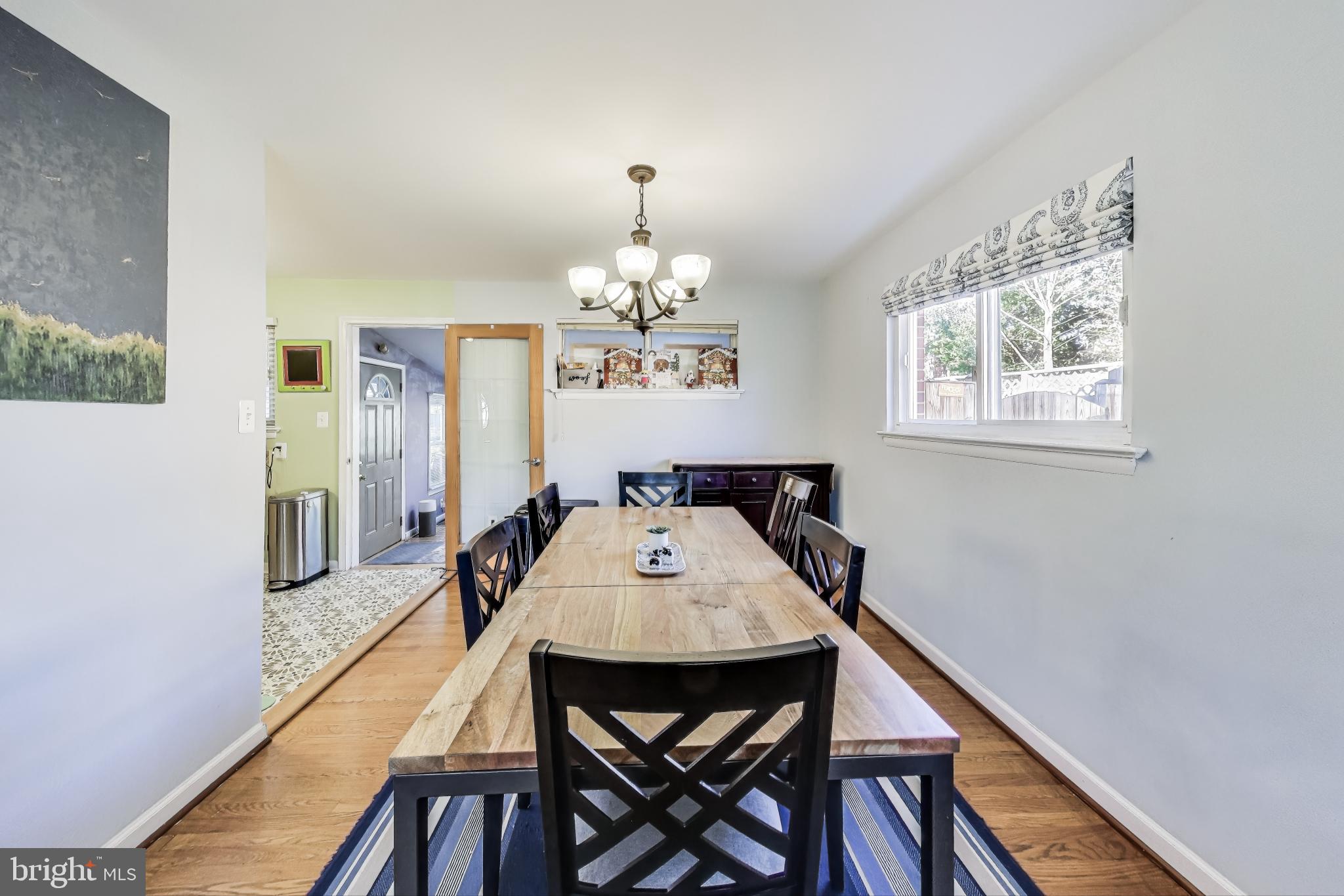 9512 Flower Avenue Silver Spring, MD 20901 - Photo 10 of 41 a view of a dining room with furniture and window