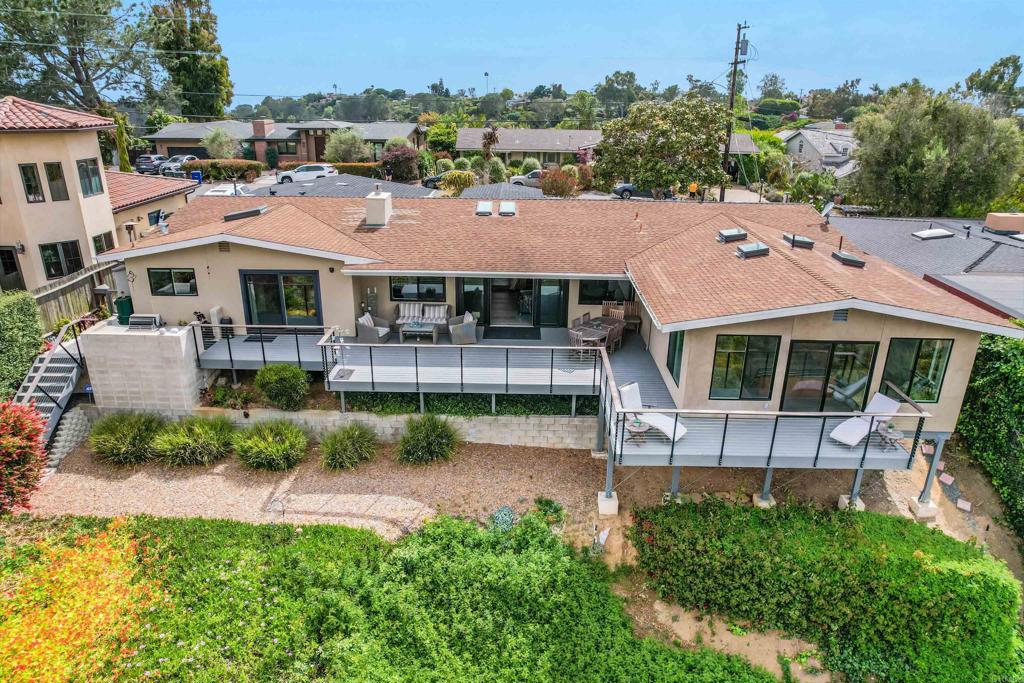 656 Canyon Drive Solana Beach, CA 92075 - Photo 2 of 29 a view of a house with a yard and sitting area