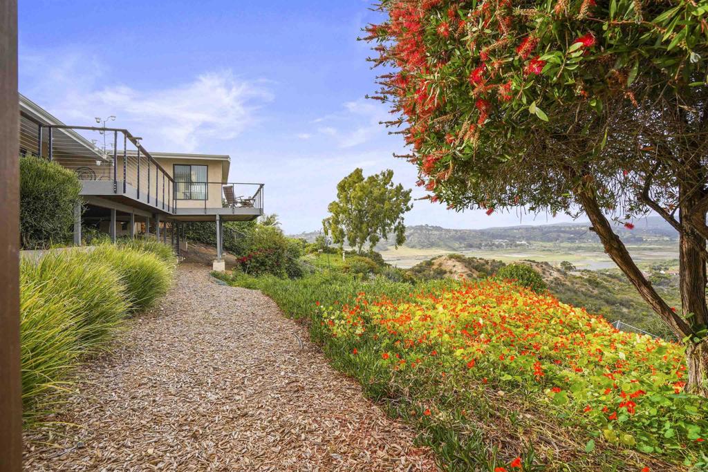 656 Canyon Drive Solana Beach, CA 92075 - Photo 29 of 29 a front view of a house with garden