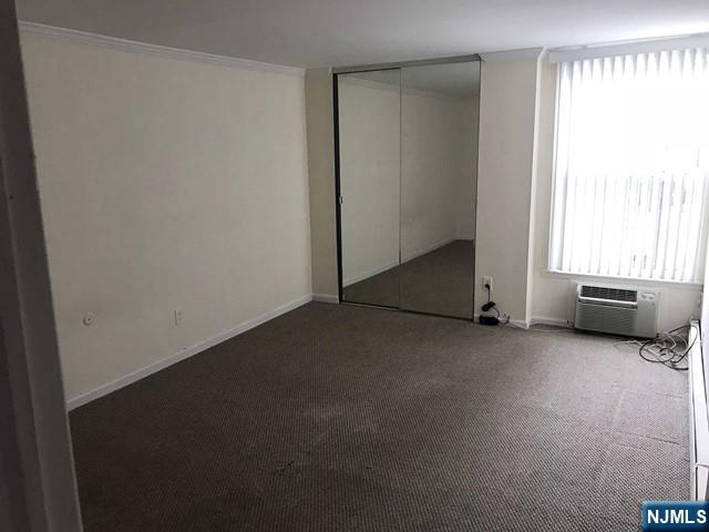 1 River Road, Unit 832L Nutley, NJ 07110 - Photo 4 of 9 an empty room with a window