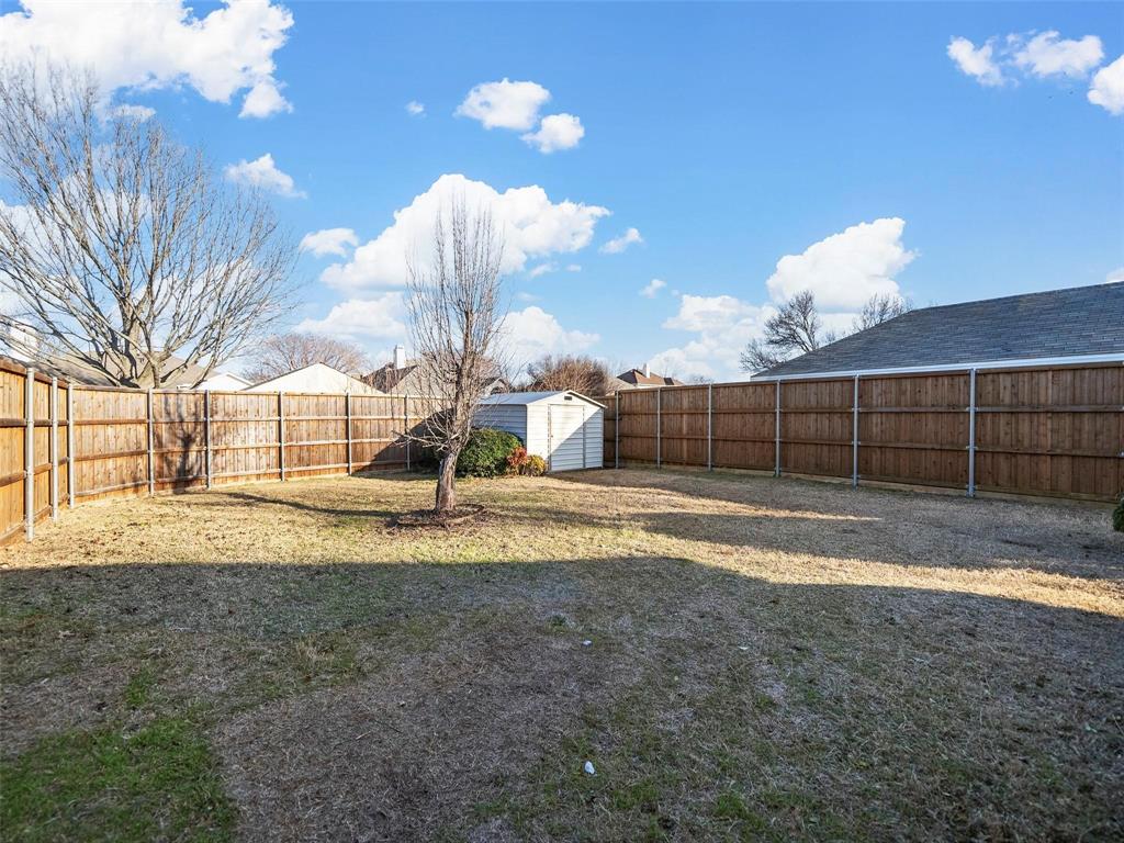 4818 Mize Court Rowlett, TX 75088 - Photo 19 of 21 a view of a backyard