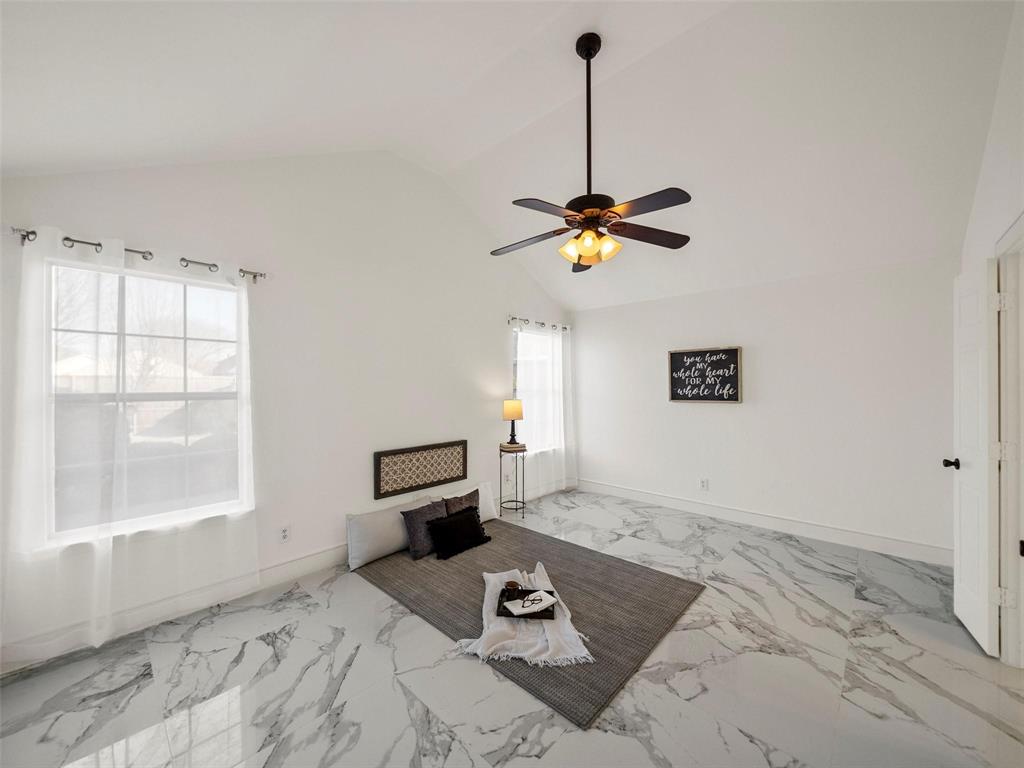 4818 Mize Court Rowlett, TX 75088 - Photo 9 of 21 a bedroom with a bed and a window