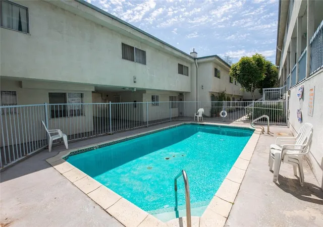 a view of a patio with a yard