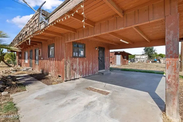 a view of a house with a patio