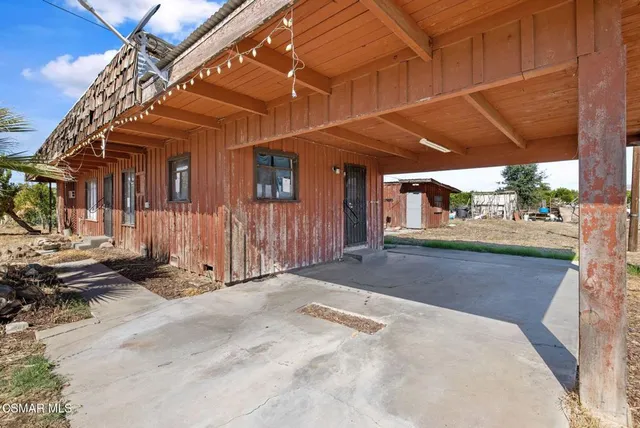 a view of a house with a patio