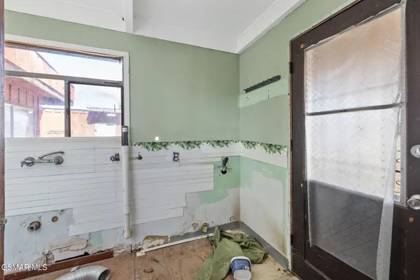 a bathroom with a sink and a shower