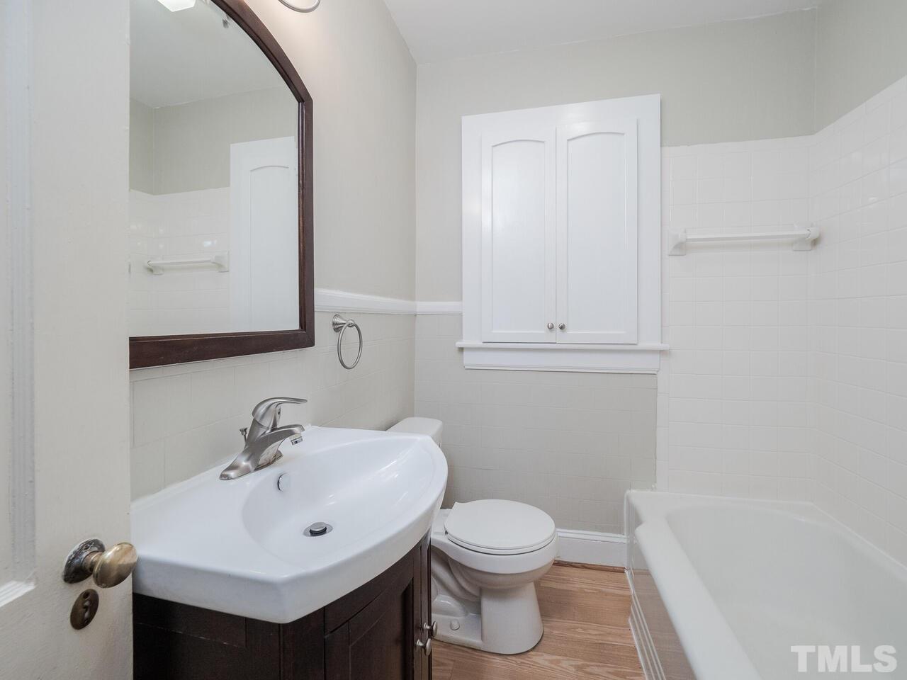 408 Morrison Avenue Raleigh, NC 27608 - Photo 11 of 29 Bath/Shower combination. Efficient use of the space.