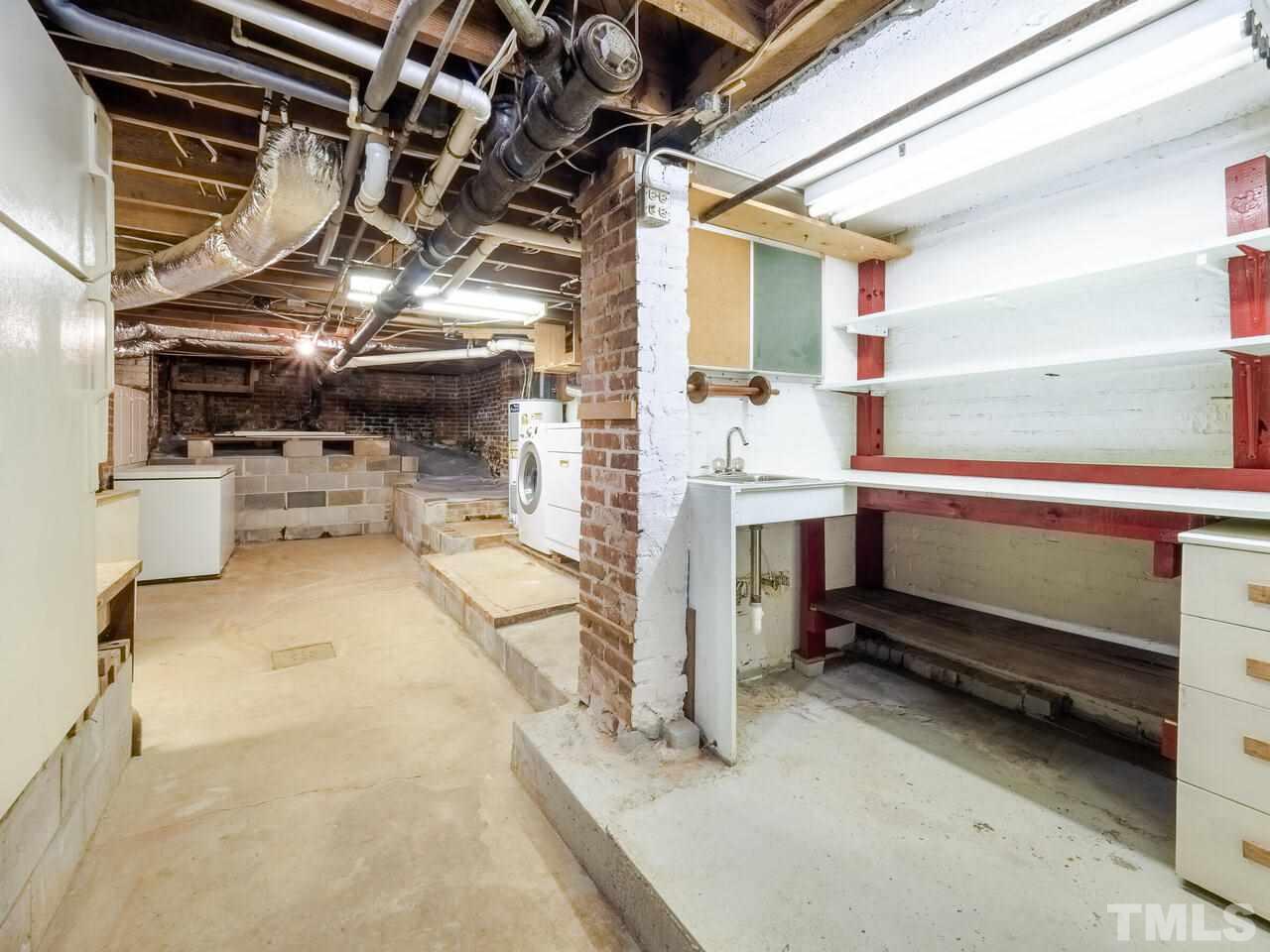 408 Morrison Avenue Raleigh, NC 27608 - Photo 22 of 29 Water is available via this sink opening possibilities for a basement wet bar.