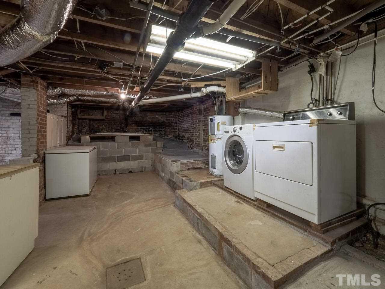 408 Morrison Avenue Raleigh, NC 27608 - Photo 23 of 29 Ample space for full size laundry.