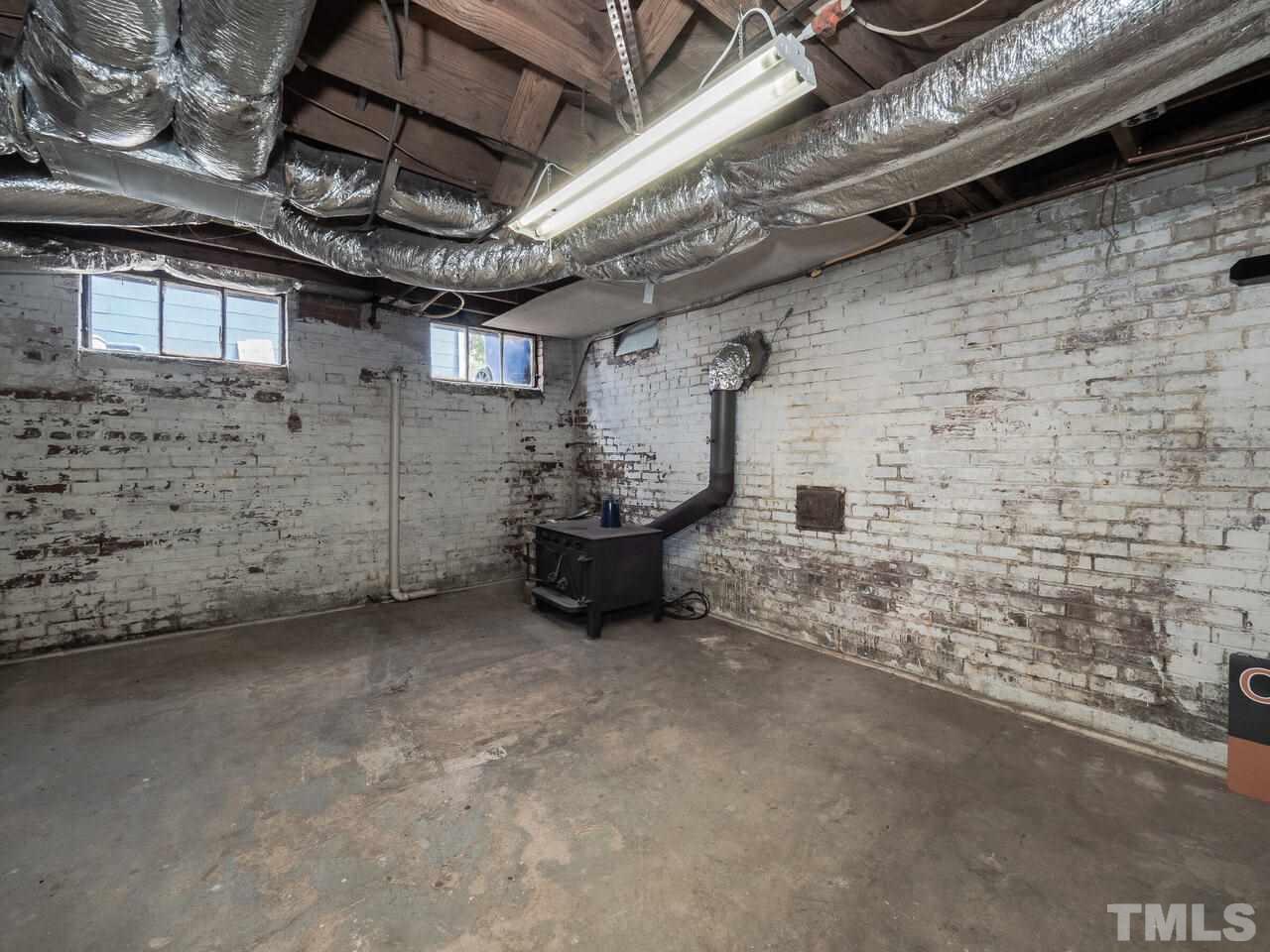 408 Morrison Avenue Raleigh, NC 27608 - Photo 24 of 29 Perfect to keep you warm while in the basement area.
