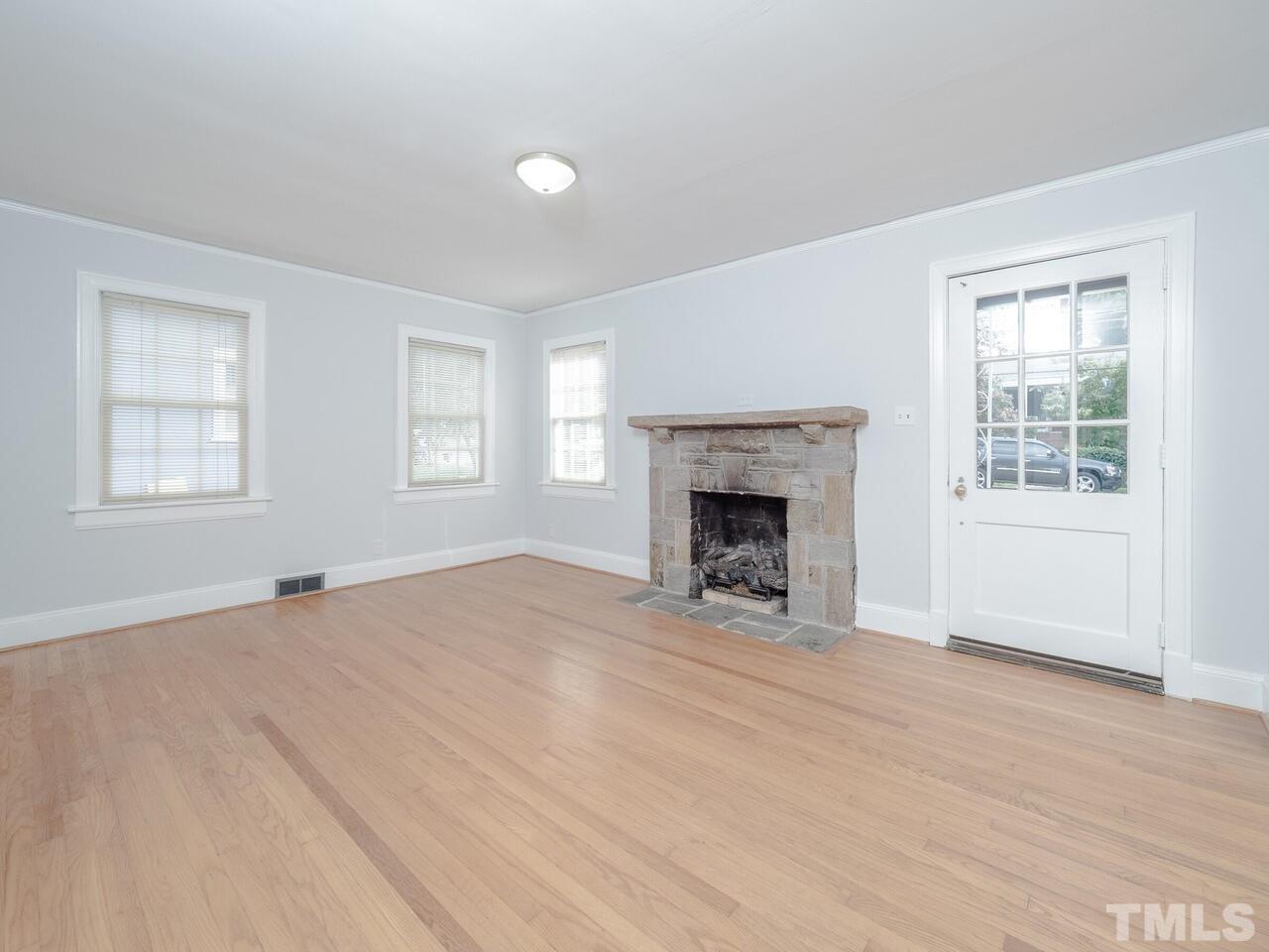 408 Morrison Avenue Raleigh, NC 27608 - Photo 4 of 29 Beautiful entrance into this cottage. 9' ceilings and period molding add to its charm.