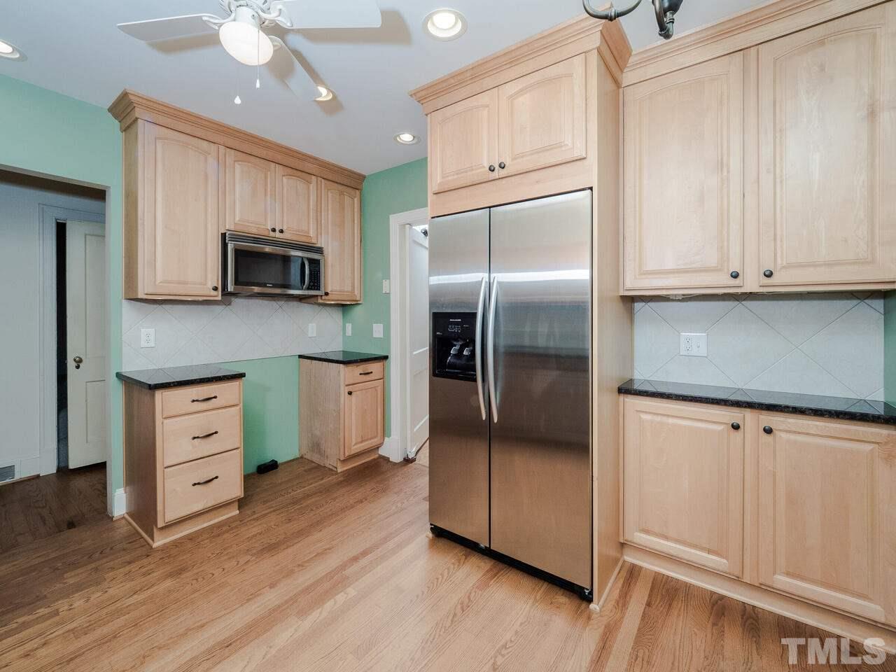 408 Morrison Avenue Raleigh, NC 27608 - Photo 9 of 29 The sale does not include an oven/stove. The current cooking option accommodates an electrical platform. However, a gas option could be accommodated by running a gas line from existing onsite gas availability.