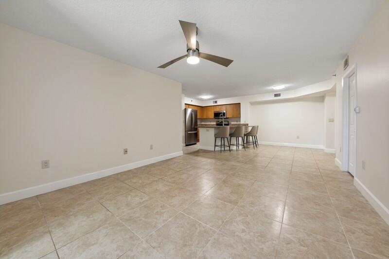 3299 Clint Moore Road, Unit 103 Boca Raton, FL 33496 - Photo 11 of 20 05_3299ClintMooreRoadUnit103_93_LivingRo