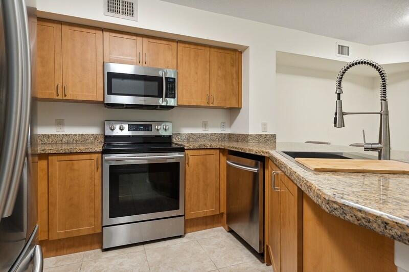 3299 Clint Moore Road, Unit 103 Boca Raton, FL 33496 - Photo 3 of 20 07_3299ClintMooreRoadUnit103_177001_Kitc