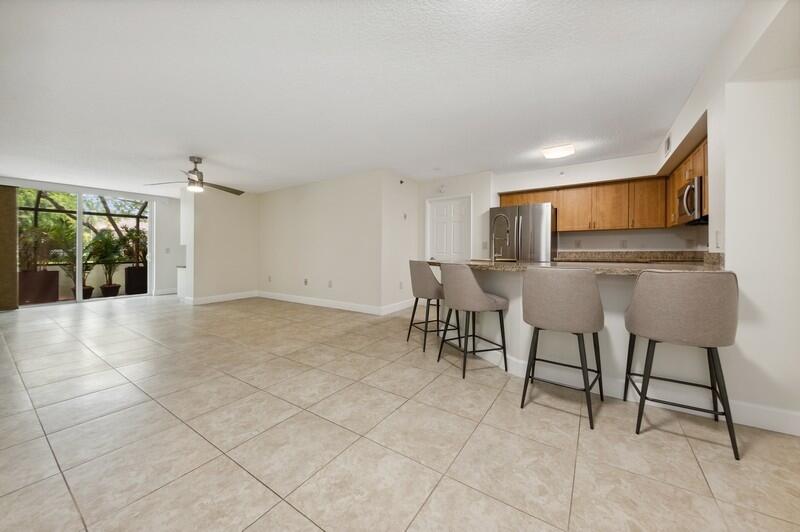 3299 Clint Moore Road, Unit 103 Boca Raton, FL 33496 - Photo 4 of 20 03_3299ClintMooreRoadUnit103_84_Entryway