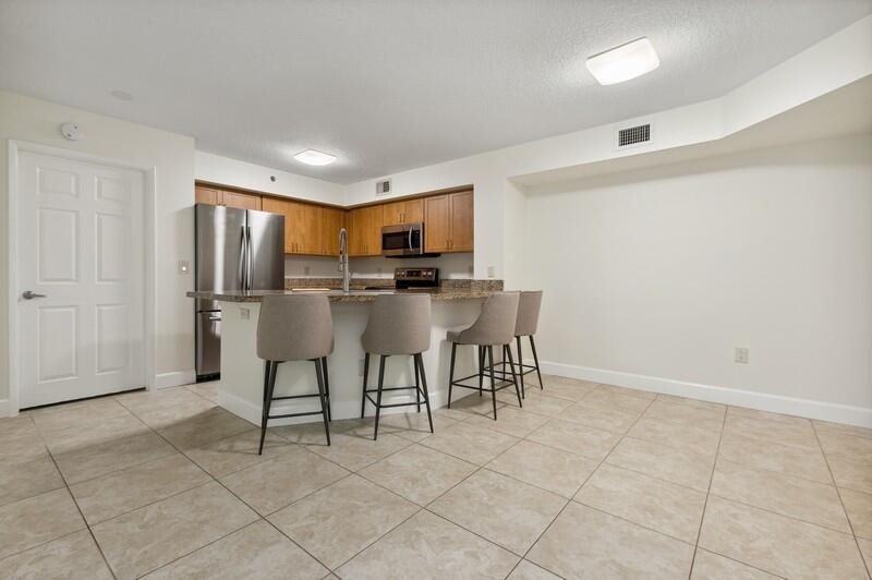 3299 Clint Moore Road, Unit 103 Boca Raton, FL 33496 - Photo 10 of 20 09_3299ClintMooreRoadUnit103_92_KitchenD